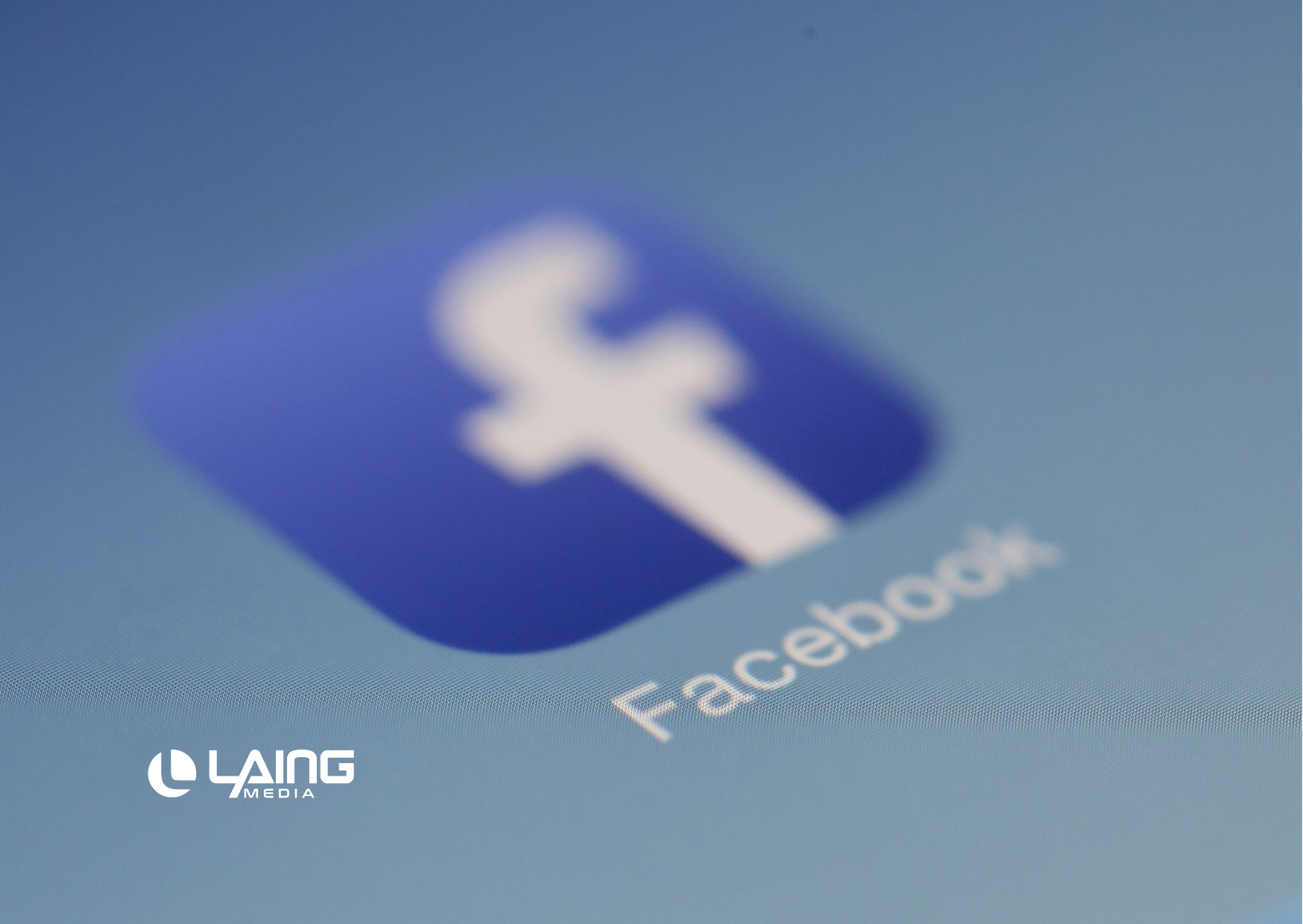 Facebook blue Icon with Laing media logo in left bottom corner